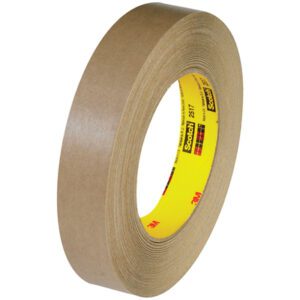 The image features a roll of 3/4 x 60 yds. 3M™ 2517 Flatback Tape with a yellow inner core branded Scotch and a red-black logo, neatly wound in a cylindrical shape, and packaged as 48 rolls per case.