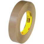 The 3M™ 2517 Flatback Tape, 3/4 x 60 yds., comes in a pack of 12 with a brown adhesive and smooth texture. It features a yellow Scotch label for easy identification.