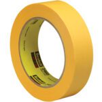 A roll of 1 x 60 yds. 3M™ 2460 Flatback Tape is shown standing upright, displaying the brand and product name against a white background, emphasizing its precision and quality. Each case contains 36 rolls.