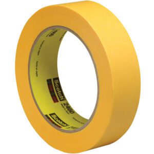 A roll of 1 x 60 yds. 3M™ 2460 Flatback Tape is shown standing upright, displaying the brand and product name against a white background, emphasizing its precision and quality. Each case contains 36 rolls.