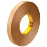 A roll of 3M™ 9425 Removable Double Sided Film Tape, size 1/2 x 72 yds, stands upright with a yellow core showing printed text.