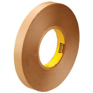 A roll of 3M™ 9425 Removable Double Sided Film Tape, size 1/2 x 72 yds, stands upright with a yellow core showing printed text.