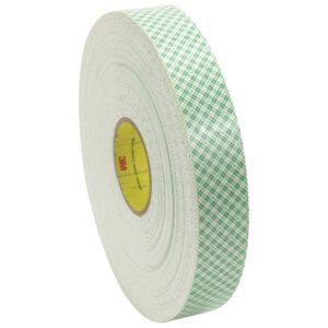 The 3M™ 4016 Double Sided Foam Tape, measuring 3/4 x 36 yds, has a green and white checkered pattern and a yellow inner core. Its available in cases of 12 rolls—ideal for your adhesive needs.