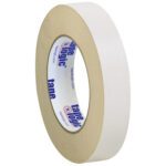 A 3-pack of Tape Logic® 1 x 36 yds. Double Sided Masking Tape is displayed upright against a white background, with tape logic in blue on the core. The tape has a smooth texture and is neatly wound.