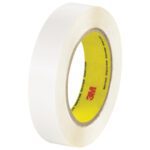 A roll of 1 x 36 yds. 3M™ 444 Double Sided Film Tape, with a yellow inner core bearing red and black text, rests on a white background.