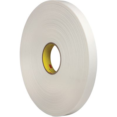 T9554462R.jpg A large 1 x 5 yds. roll of 3M™ 4462 Double Sided Foam Tape stands upright on a plain background, showcasing its wide diameter with layers coiled around a brown core, and a hint of yellow surface visible inside.