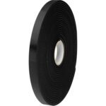 A 3/4 x 36 yds. black Tape Logic® double-sided foam tape stands upright against a white backdrop, featuring a smooth, glossy finish and dark color, tightly wound around a white core.