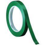 A 3-pack of 3M Vinyl Tape 471, sized at 1/4 x 36 yds., reveals its adhesive and non-adhesive sides. The green tape with a shiny finish comes in a case of three, featuring a pristine white inner core.