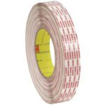 The 1/2 x 360 yds. (2 Pack) 3M™ 476XL Double Sided Extended Liner Tape has a roll with red text on a white backdrop, showcasing its thickness. The yellow core shows off the red 3M logo, and the tapes side is clean and precisely cut.