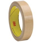 A 3/4 x 60 yds. 3M™ 927 Adhesive Transfer Tape roll, with a yellow inner label and red logo, stands upright on a white background; its part of a case containing 48 rolls.