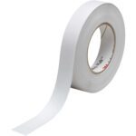 A partially unrolled roll of white adhesive tape shows its textured surface, similar to the 1 x 60 Clear 3M™ Safety-Walk™ Tape - 220. Inside the roll, brand markings and vibrant text in red and black can be seen.