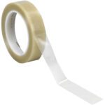 A roll of 1 x 36 yds. Clear (3 Pack) 3M Vinyl Tape 471 features its transparent adhesive with a partially unrolled piece extending forward. The white interior contrasts against the glossy finish of the clear tape.