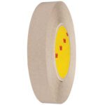 A 1 x 60 yds roll of 3M™ 9627 Adhesive Transfer Tape Hand Rolls, featuring a yellow core with red writing, lies on its side against a white background.