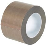 An image shows a roll of MH-USA 3 x 18 yds. 3 Mil - PTFE Glass Cloth Tape (18 Yds/Roll) with its brown textured surface, neatly wound around a core, and the edge slightly lifted at the start.