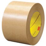 Standing upright, the 3 x 60 yds. (1 Pack) 3M™ 465 Adhesive Transfer Tape Hand Roll features a yellow inner core with the red 3M logo, and boasts a smooth, matte finish perfect for precision applications.
