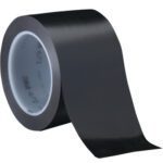 A partially unrolled roll of 3 x 36 yds. Black (3 Pack) 3M Vinyl Tape 471 with a shiny black surface and wide width reveals its white interior with gray markings, all set against a plain white background.