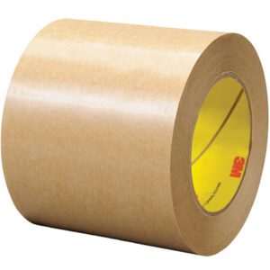 The 4 x 60 yds. (1 Pack) 3M™ 465 Adhesive Transfer Tape Hand Roll features a brown adhesive paper tape, visible logo on the core, and a smooth surface, shown resting at an angle against a white background.