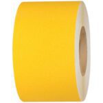 The 4 x 60 Yellow Heavy-Duty Tape Logic® Anti-Slip Tape, a sturdy cylindrical roll with a cardboard core, stands against a white background emphasizing its robust design and safety features.