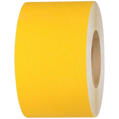 T96960Y.jpg The 4 x 60 Yellow Heavy-Duty Tape Logic® Anti-Slip Tape, a sturdy cylindrical roll with a cardboard core, stands against a white background emphasizing its robust design and safety features.