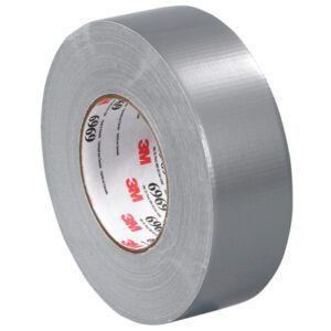 A 2 x 60 yds. Silver (3 Pack) 3M™ 6969 Duct Tape roll partially unspooled, features a visible brand label inside the core, highlighting its durable texture.