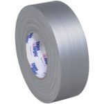 A large roll of 3 x 60 yds. Tape Logic® 11 Mil Gaffers Tape sits upright, partially showing its brand on the inner cardboard ring. This gray tape has a smooth surface and is neatly rolled, making it perfect for any project you have in mind.
