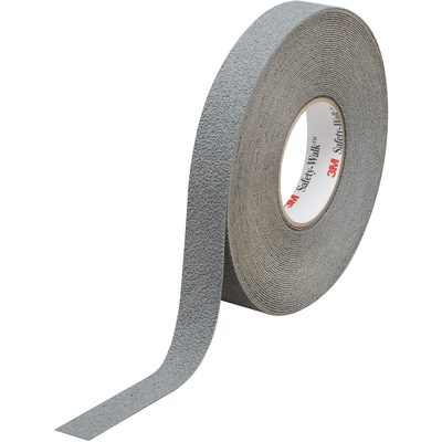 T991370.jpg A roll of 1 x 60 Gray 3M™ Safety-Walk™ Tape - 370 stands upright with part of the textured tape unrolled, showing the brand on the inner core. This essential anti-slip tape offers safety and durability and is available in a case of four rolls.