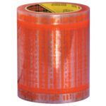 A 5 x 6 3M™ 824 Pouch Tape Roll, characterized by red stripes for security, is partially unrolled to display its textured pattern. This reliable and secure tape roll is set against a plain background.