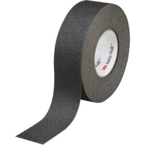 The 2 x 60 Black 3M™ Safety-Walk™ Tape - 610, featuring the brand logo on its inner cardboard ring, offers enhanced grip with its textured surface. Each case includes two rolls for added convenience.