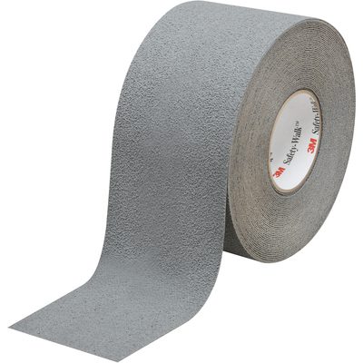T994370.jpg A 4 x 60 roll of Gray 3M™ Safety-Walk™ Tape - 370, partly unrolled, displays its textured surface. Upright, it shows the inner cardboard core with a small red logo inside.