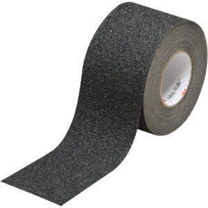 A partially unrolled 4 x 30 Black 3M™ Safety-Walk™ Tape - 710 displays its grip-enhancing texture against a plain white background, highlighting its safety features.
