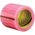 The 4 x 72 yds. Scotch® Label Protection Tape 821 is pink with a black and red plaid stripe and vibrant yellow interior text, ideal for packaging. Its conveniently available in packs of 8/Case.