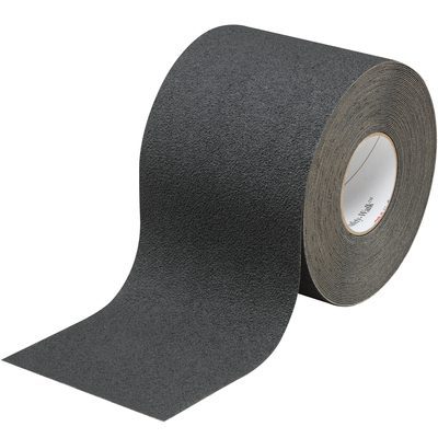 T996310.jpg A 6 x 60 Black 3M™ Safety-Walk™ Tape roll (310 Model) partially unrolled shows its anti-slip texture. The sturdy roll stands upright, emphasizing the impressive length and dependable grip of this essential safety tool, available as one roll per case.
