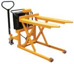 A Vestil Tote-A-Load Dc Power 21 X 43 features a yellow hydraulic pallet jack with black handles, two lifting prongs, base wheels, and an adjustable lifting mechanism for moving pallets in warehouses or storage spaces.
