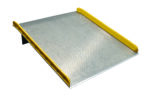 A sturdy metal ramp with a textured surface and raised yellow edges mirrors the robust design of the Vestil Aluminum Dock Board Steel Curb 15K 60X72, perfect for loading or accessibility requirements.
