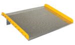 The Vestil Aluminum Dock Board Steel Curb 15K 72X60, featuring a diamond plate surface and yellow edge guards, is designed to bridge the gap between a dock and a truck for safe goods transfer.