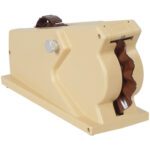 The beige retro tape dispenser, similar to the classic 3M™ M96, features a brown serrated wheel and a silver adjustment knob on the side. Its angular and utilitarian design echoes older models.