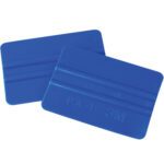A pair of blue plastic squeegees labeled P.A-1 and 3M with smooth edges, slightly overlapping, are 3M™ PA1-B Blue Hand Applicators. Vital for vinyl application and surface smoothing, they come in cases of 25.