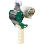 The Tape Logic® 2 Seal Safe® Carton Sealing Tape Dispenser, featuring a beige handle, green metal frame, and a gray plastic wheel labeled tape logic, is expertly designed for easy holding and dispensing of packing tape.