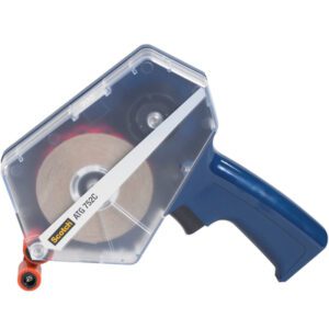 The 3M™ 752 Adhesive Transfer Tape Dispenser features a clear plastic cover that reveals the large adhesive roll inside. Its blue handle complements the Scotch ATG 752C label, and the design ensures precise application every time, all set against a white background.
