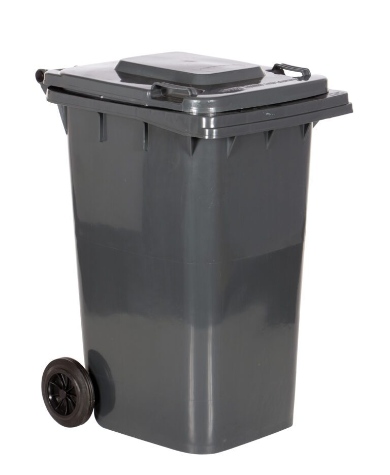 TH-64-GY_A.jpg The Vestil Gray Poly Trash Can 64 Gal Capacity is a large, dark gray wheeled bin with a closed lid, two black wheels, and a side handle for easy maneuverability when viewed from an angle.