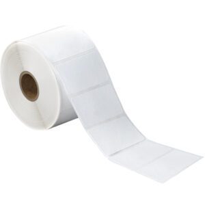 A roll of MH-USA 2 1/4 x 1.25 White Desktop Direct Thermal Labels (1135/Roll) reveals blank, white, rectangular labels with uniform perforations, extending outward while the brown cardboard core is visible in the center.