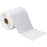 The MH-USA 4 x 1 1/2 white desktop direct thermal labels roll, partially unrolled, reveals rectangular labels on a continuous sheet. These labels have a slight sheen and easy-to-separate perforations, with the cylindrical roll holding 960 labels on a sturdy cardboard core.