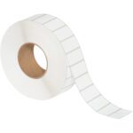 The MH-USA 2 x 1 White Thermal Transfer Labels (5100/Roll) unwind smoothly, revealing straightforwardly spaced rectangular labels with slight gaps for flawless application, all supported by a sturdy brown cardboard core.
