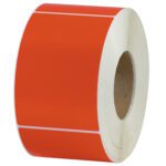 A partially unrolled roll of MH-USA 4 x 6 Red Thermal Transfer Labels (1000/Roll) rests on a white backdrop, showcasing the rectangular labels with white borders between them and revealing the rolls core.