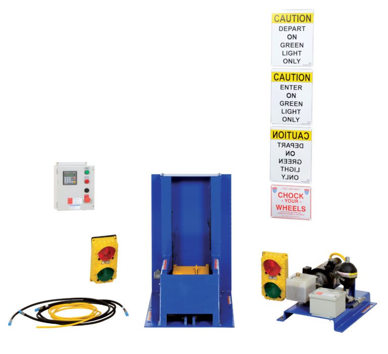 TL-100-F-S_A.jpg Industrial equipment setup with a central Vestil Electric Hydraulic W/Poly Light Pkg, flanked by traffic lights, control unit, cables, and hydraulic pump. Caution signs about green light instructions are on a pole to the right.