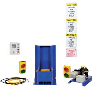 Industrial equipment setup with a central Vestil Electric Hydraulic W/Poly Light Pkg, flanked by traffic lights, control unit, cables, and hydraulic pump. Caution signs about green light instructions are on a pole to the right.