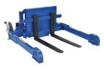 The Vestil Tilt Master Strad Ac Power, with a blue metal fork attachment, efficiently lifts pallets up to 2000 lb. It has two black prongs and a hydraulic mechanism, set against a plain white background to highlight its robust design.