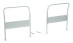 Two white metal bed rails with flat rectangular panels stand upright against a white background, accompanied by small hardware pieces like screws and wall plugs, precisely arranged as in the Vestil Dual Handle Set Trs-2429-Dh Truck.