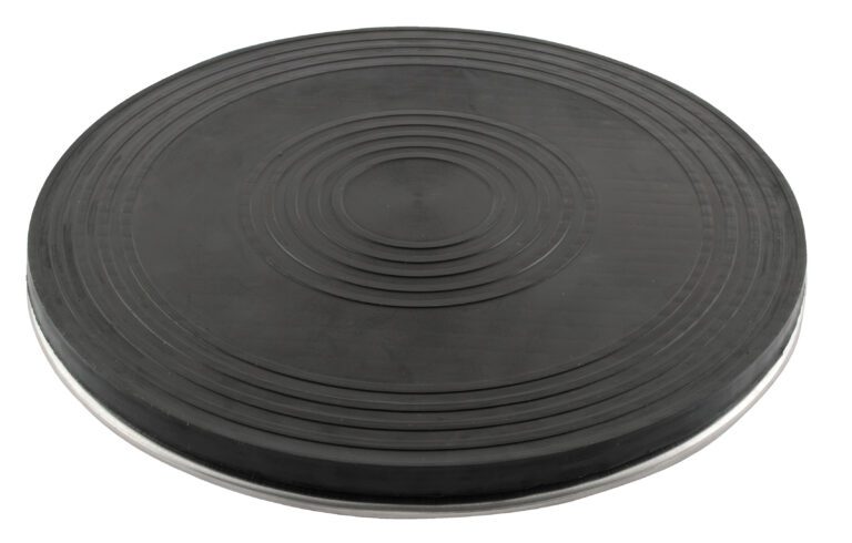 TT-12-7-8_A.jpg The black, circular design of the Vestil Turntable is echoed in the exercise balance disks elegant concentric ring patterns. With a 12-inch diameter and capacity for up to 0.5K weight, this disk provides stability training against a white backdrop.