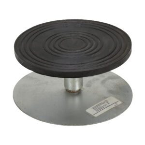 The Vestil Turntable 8 In Diameter 3.9375 In H 0.5K features a sleek metal design with a circular black rubber top, concentric circles, and supports up to 0.5K weight efficiently.